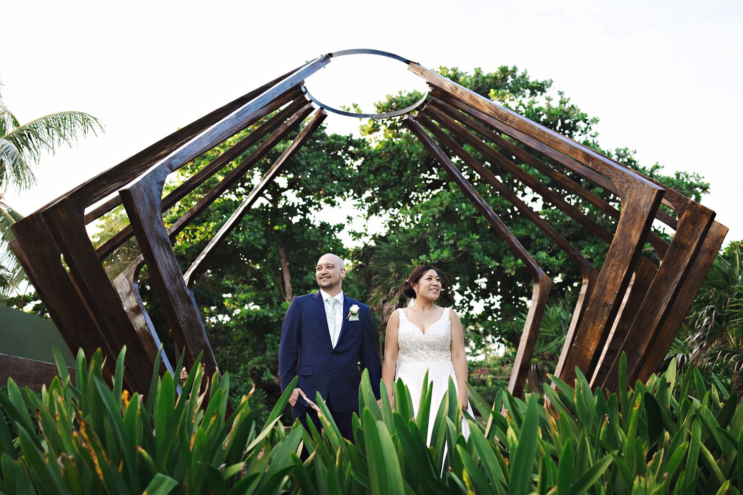 Bride and groom at The Fives Beach Hotel Riviera Maya, captured by Quetzal Wedding Photo.