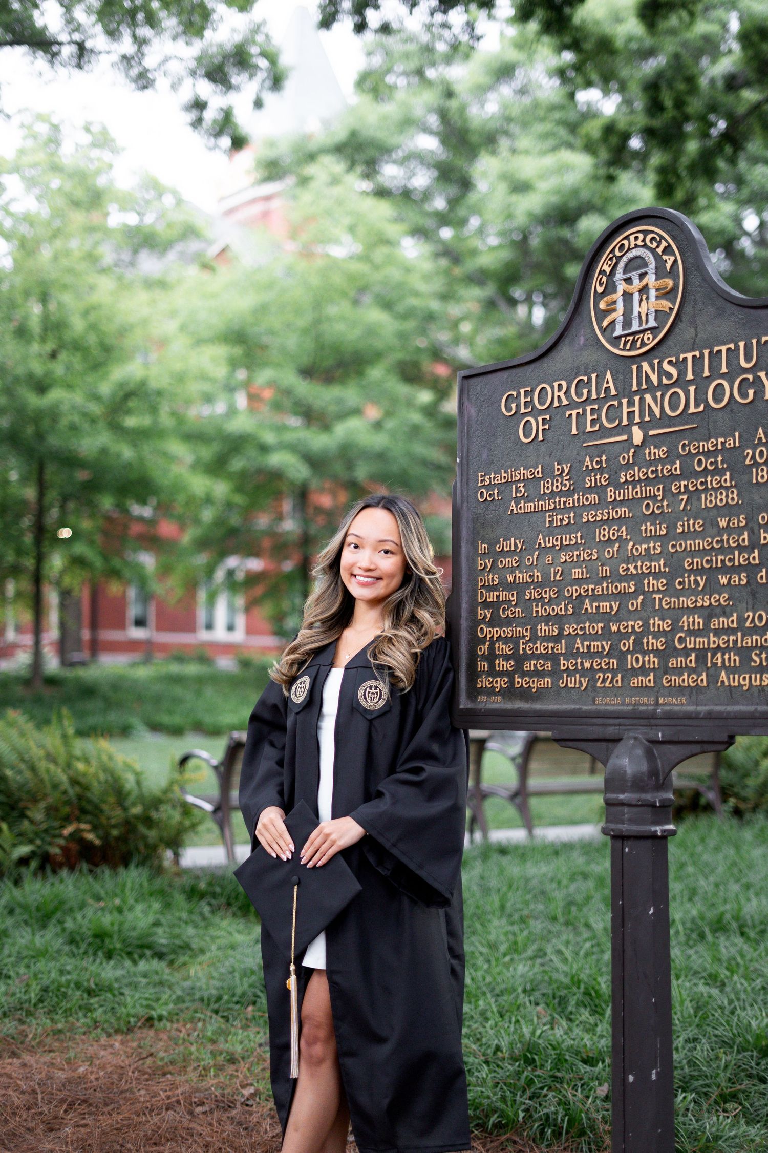 Side-by-side Atlanta graduation portraits showing how sunny and cloudy weather affect lighting and background detail