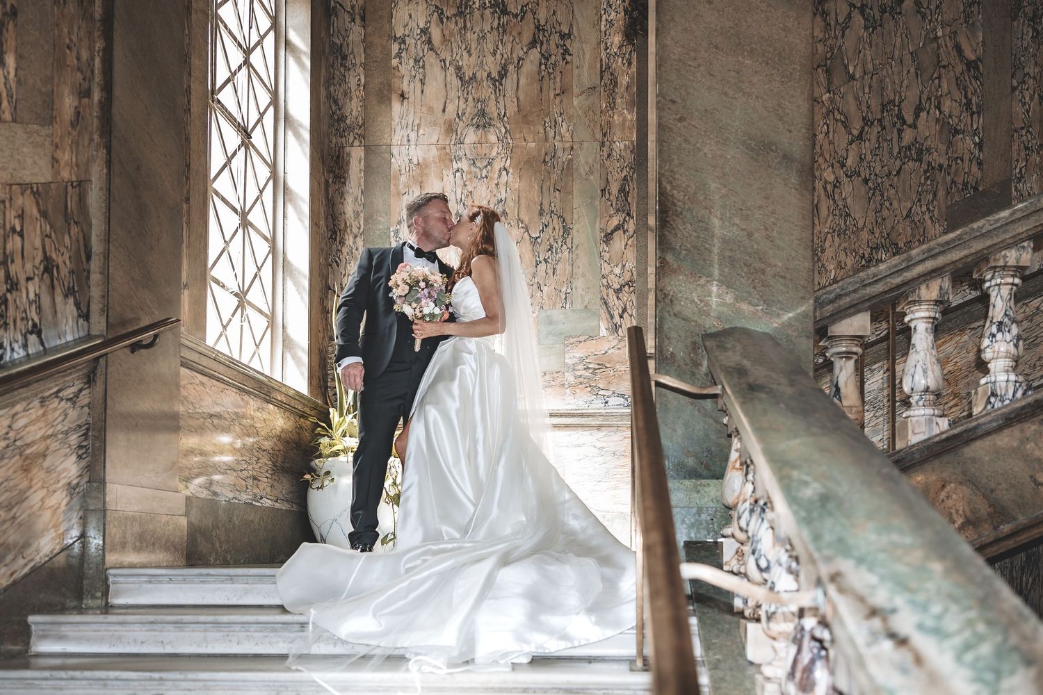 Relaxed couple portraits inside Hull Guildhall