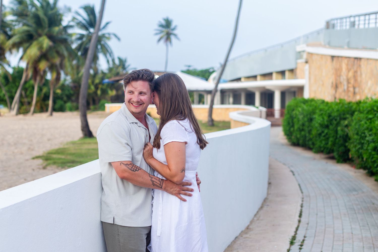 Couples portrait near the beach at Balneario del Escambrón in Old San Juan, Puerto Rico.