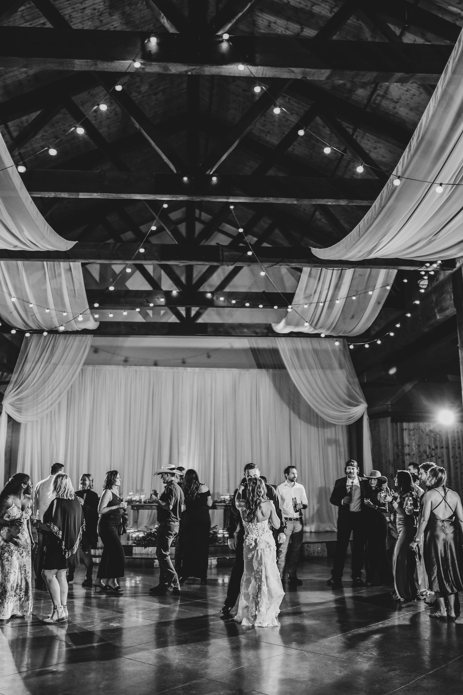 Guests dancing late into the night at a rustic ranch wedding