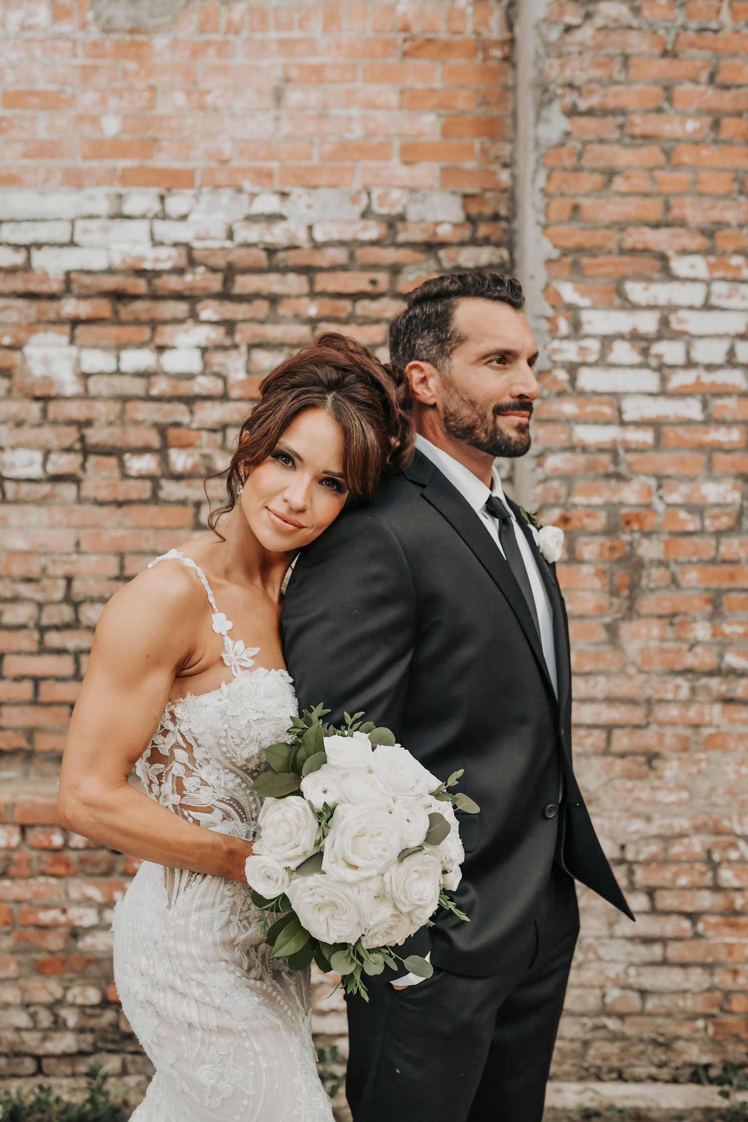 Candid newlywed laughter during Cotton Mill wedding portraits