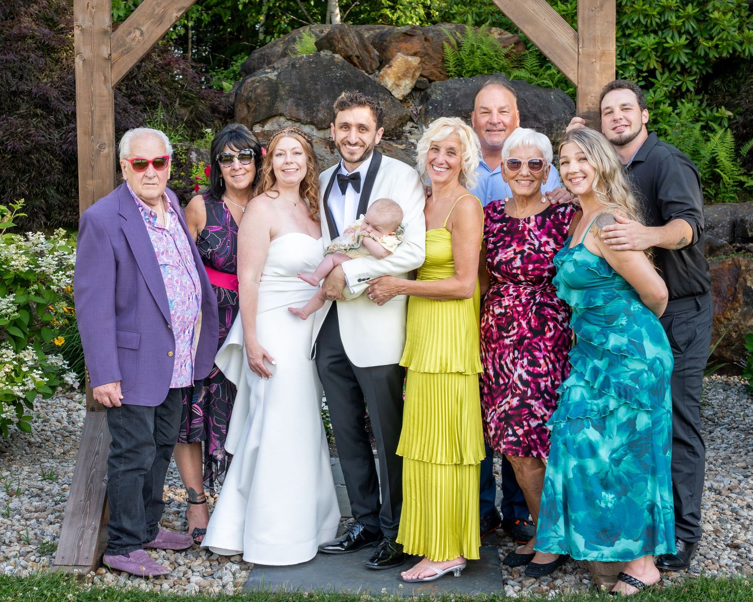 Family at a wedding near the Merrimack Valley, smiling in a family photo