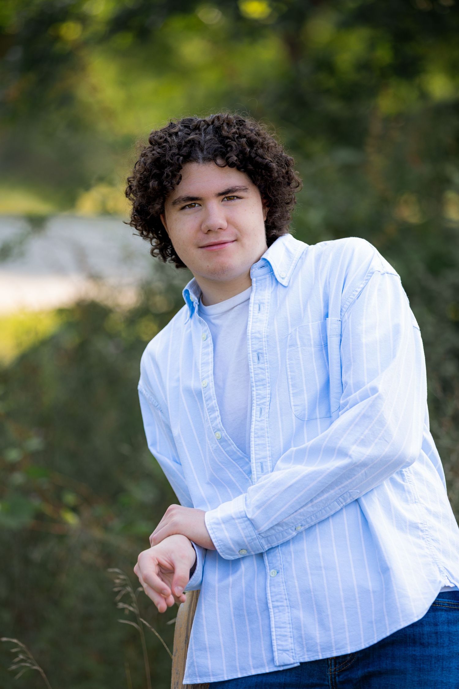 Relaxed outdoor high school senior boy pictures at Island Lake in Brighton, MI by South Lyon photographer