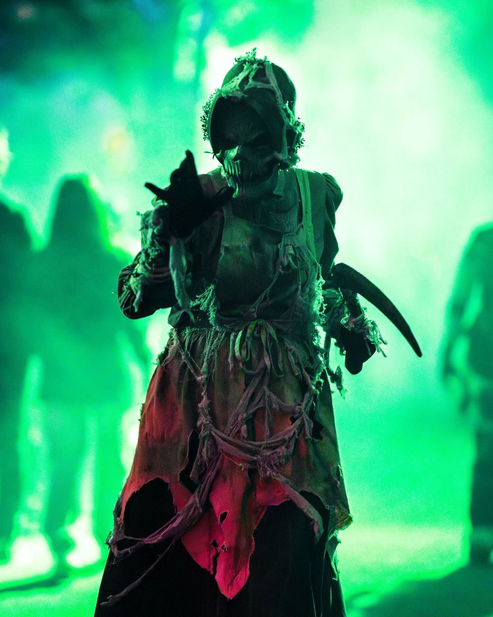 Portrait of a Knott’s Scary Farm monster in full costume and makeup during Halloween season, captured by Chris Cornish Photography.