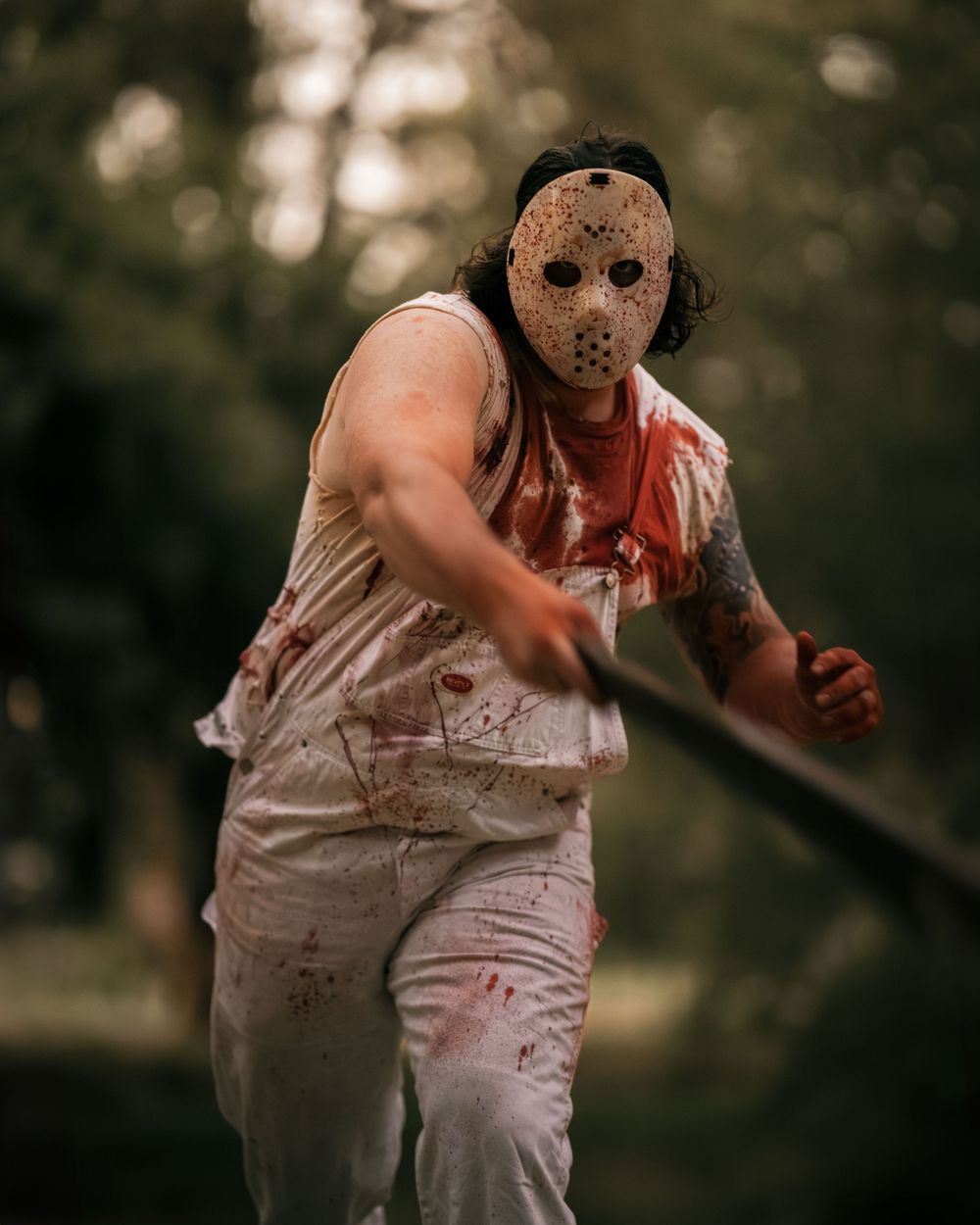 a Jason Friday the 13th inspired photoshoot with a male bloody model