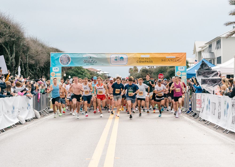 Large group of runners at the starting line of the Seaside Half Marathon in Seaside FL