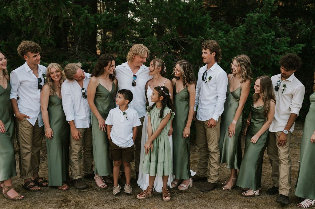 Couple couple laughing with bridal party Vancouver Island. Photography by Photographer Soulfull Photographs