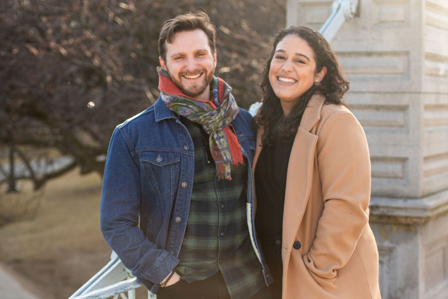 smiling couple on boston public garden bridge