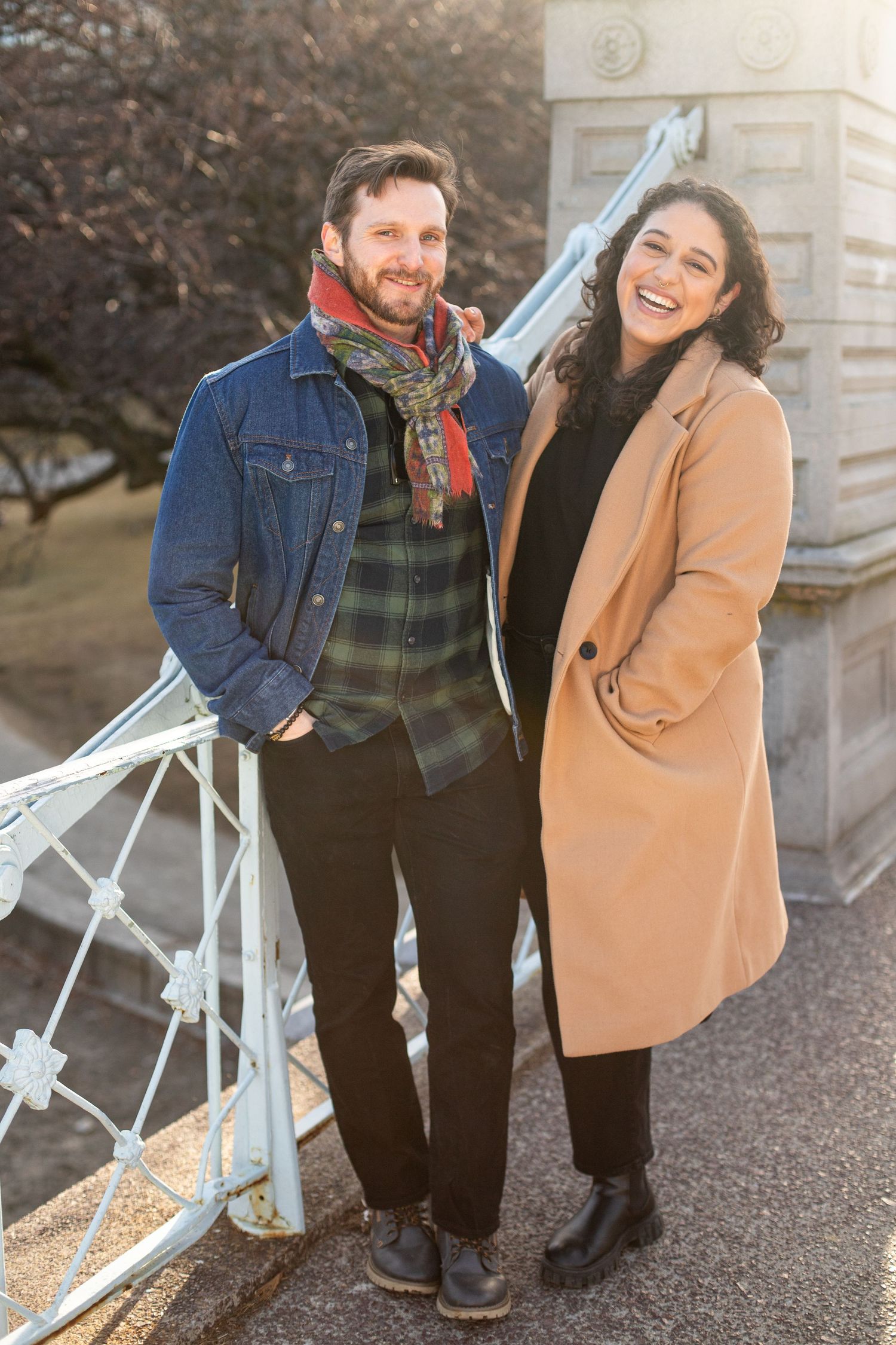 smiling couple on boston public garden bridge