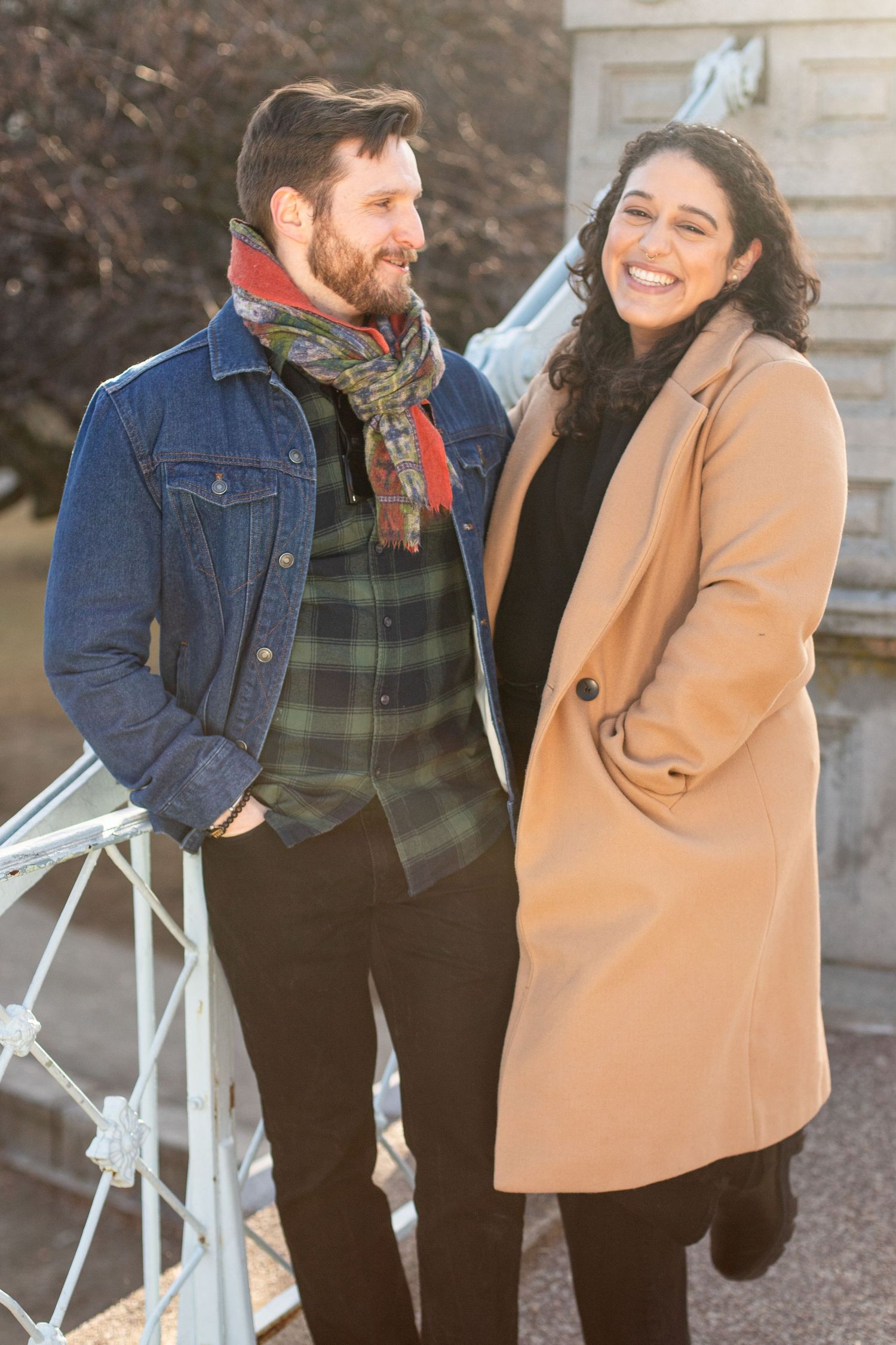 smiling couple on boston public garden bridge, candid photo