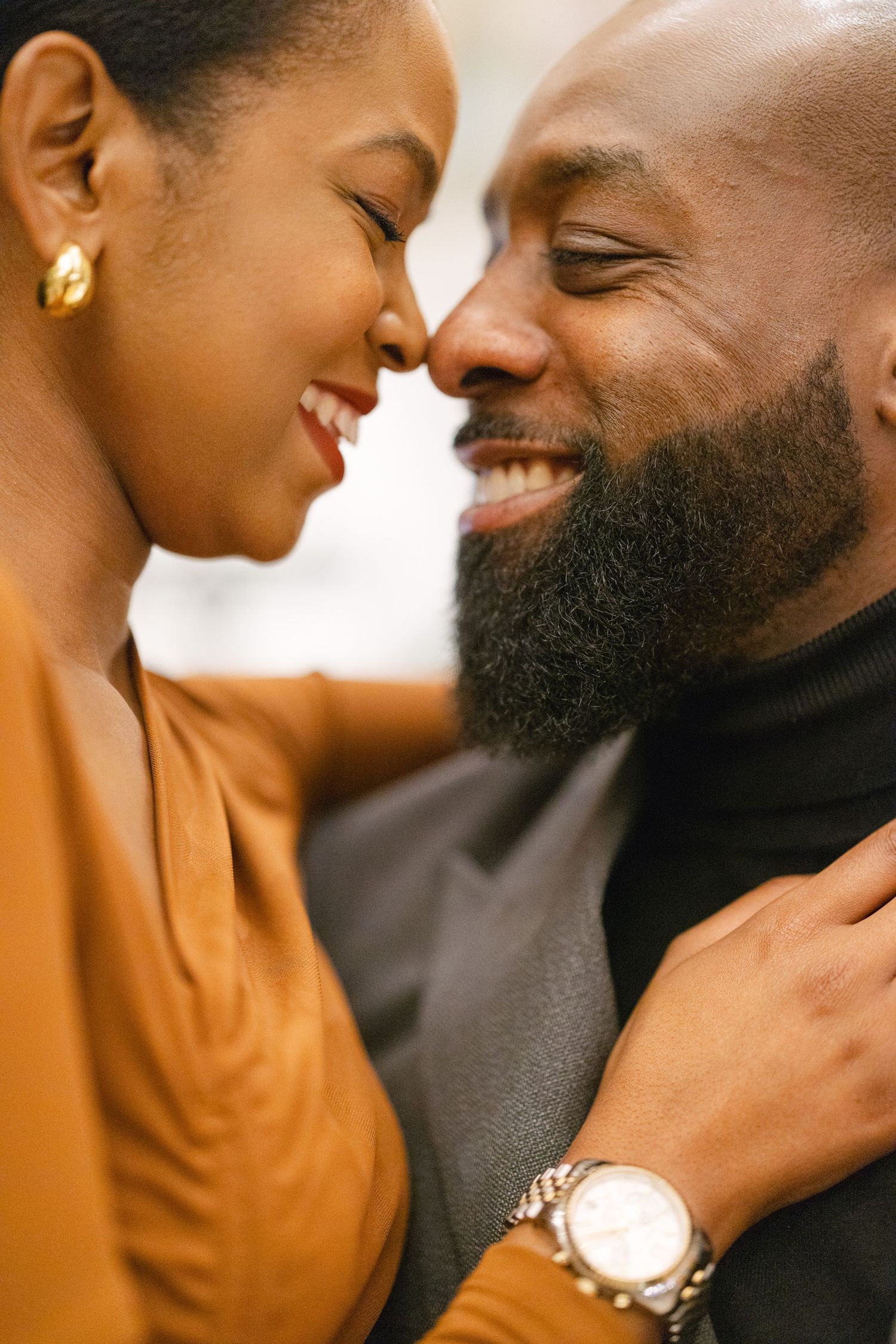 Close-up shot of a couple sharing an intimate romantic moment.