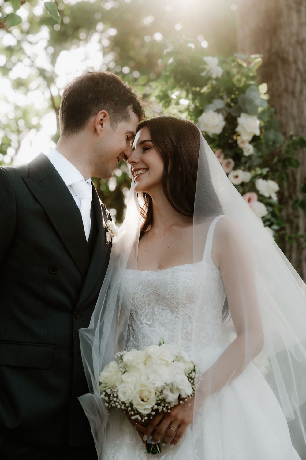 A couple looking at each other right after their wedding in Villa Sagredo.