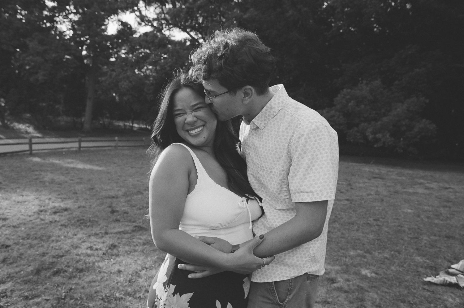 Black and white series showing couple's playful and romantic interactions.