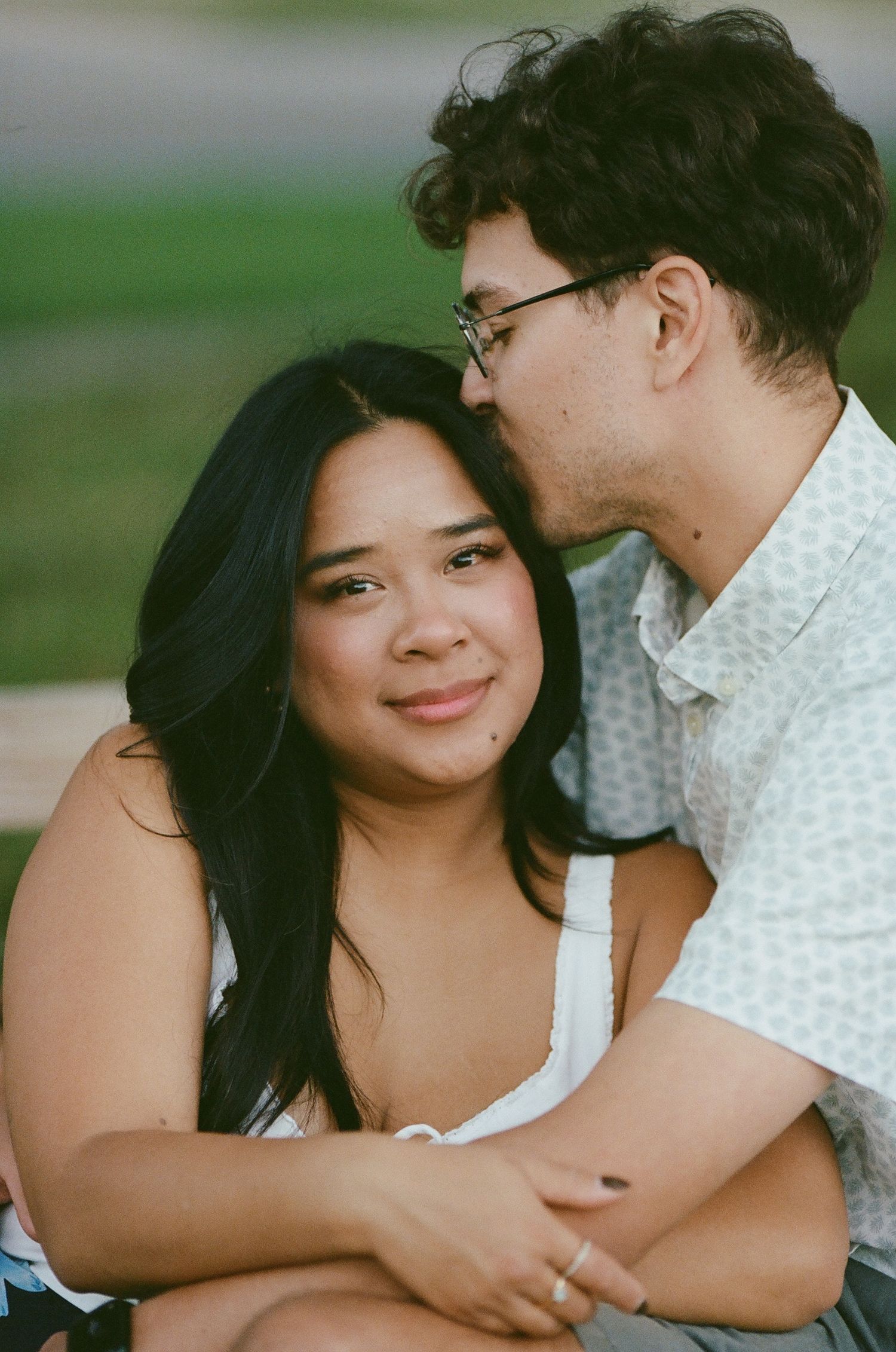Intimate portrait of a couple sharing a tender moment together.