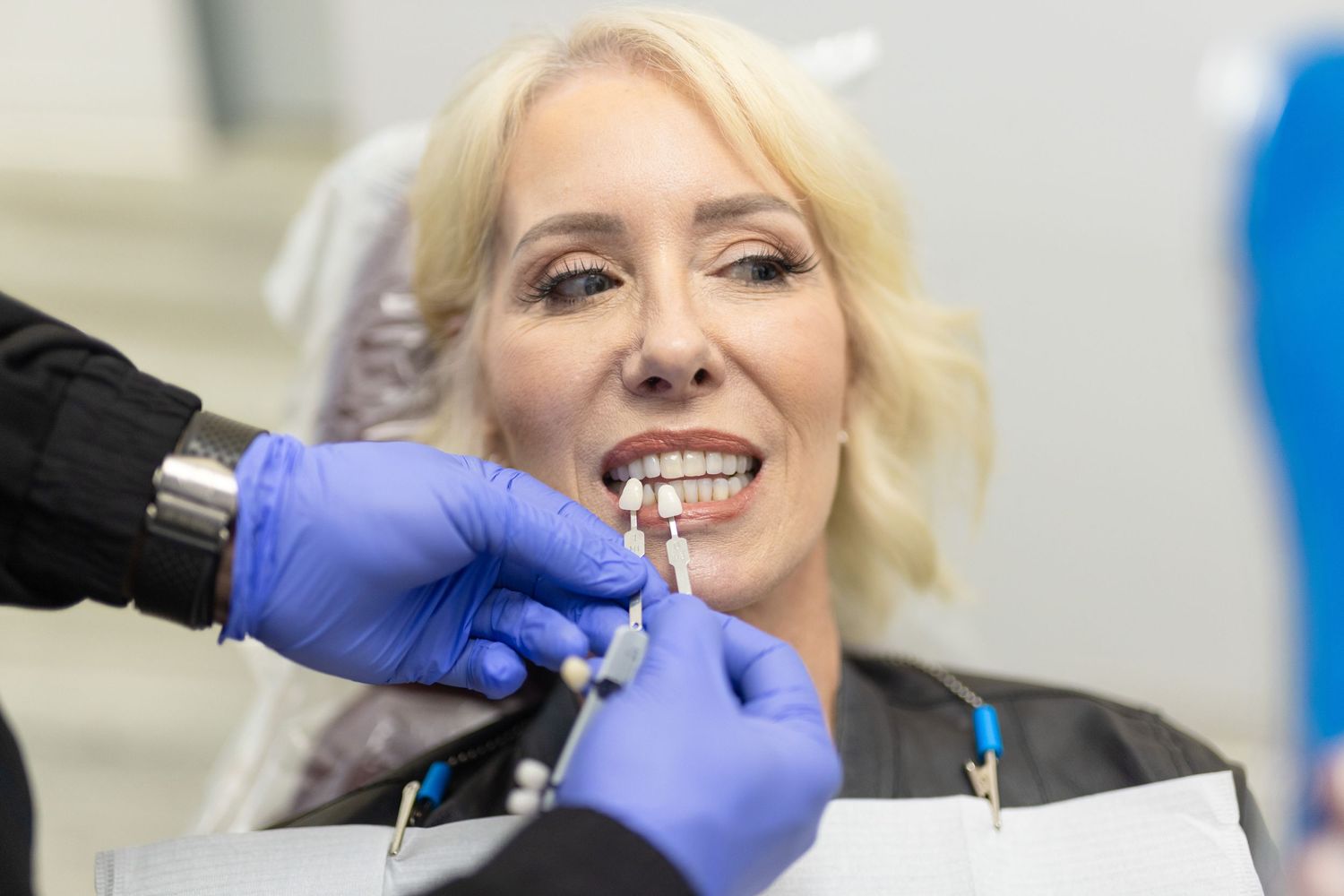 A dental procedure being performed in a professional clinical setting.