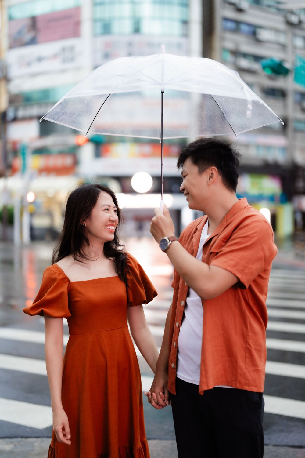 a couple wearing orange in Ximending