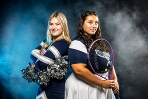 Athletes representing cheerleading and tennis pose together in dramatic studio lighting.