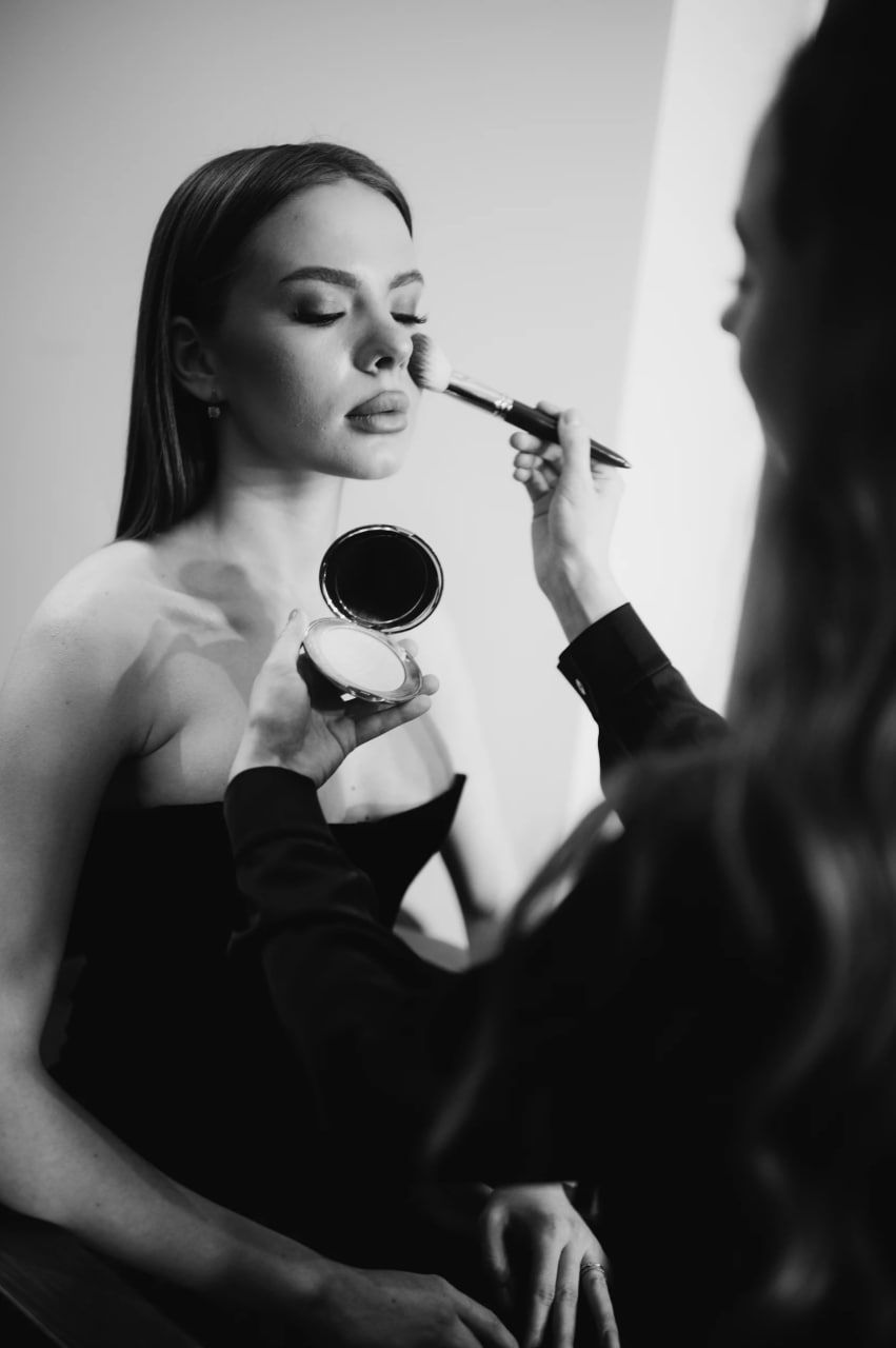 Cambridge bridal makeup artist creating soft glam wedding look.