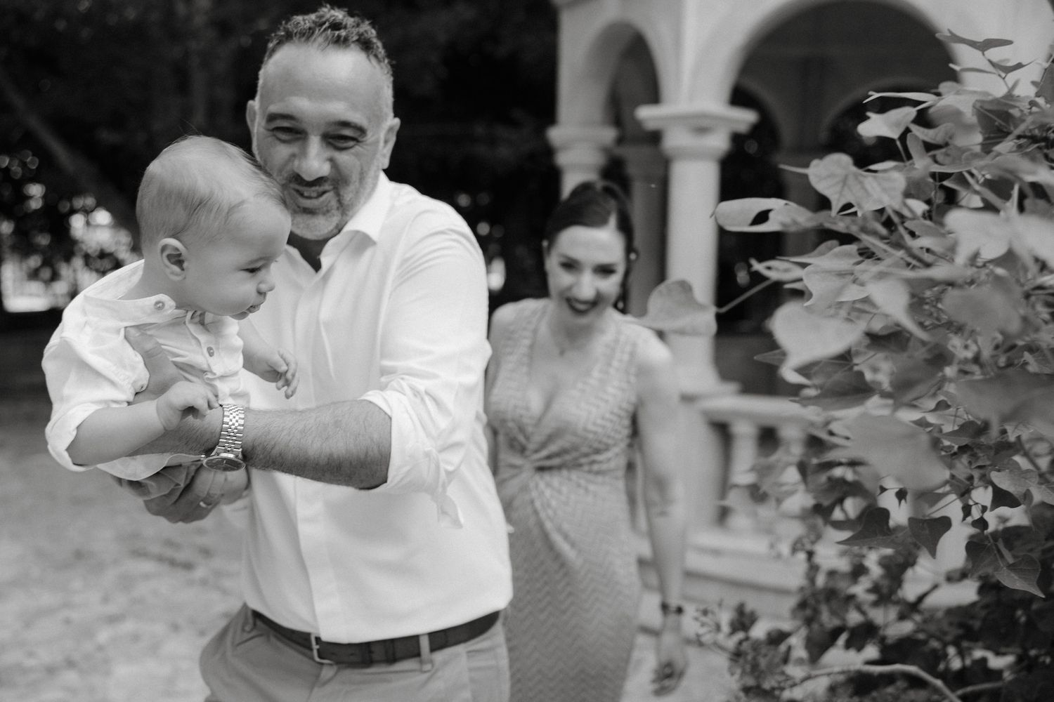 Limassol family taking photos before christening service in front of the Greek Orthodox Church