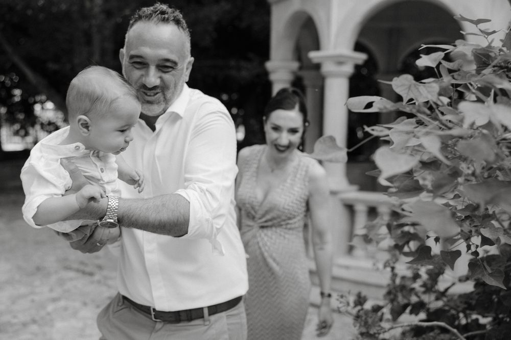 Limassol family taking photos before christening service in front of the Greek Orthodox Church