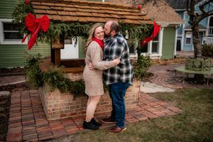Large city Christmas tree makes for a great backdrop for family holiday card photos.