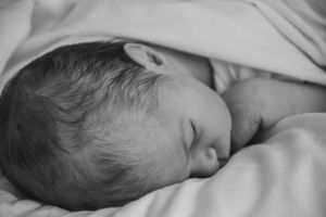 Newborn photo of sleeping baby