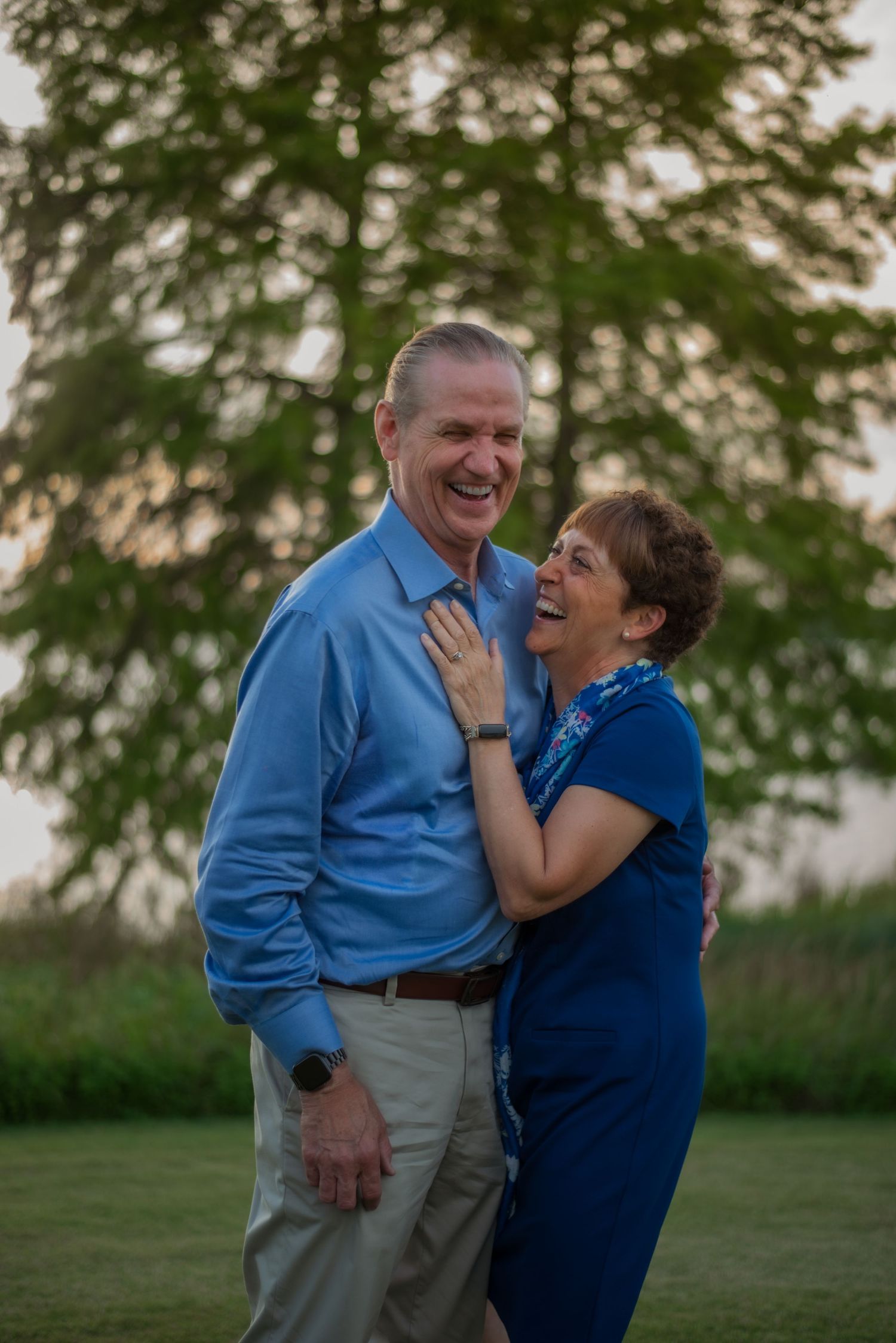 Older couple smiling in candid photograph