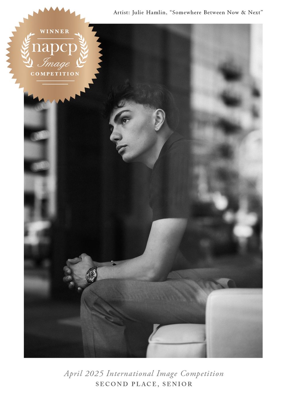 Black and white artistic portrait photograph with NAPCP award badge showing subject in contemplative side profile pose.