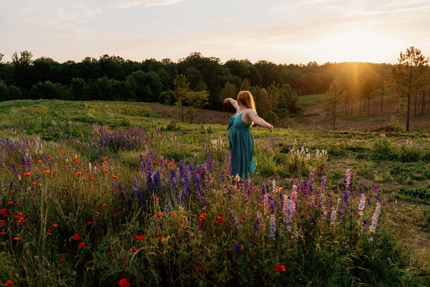 A girl dancing in a flower field