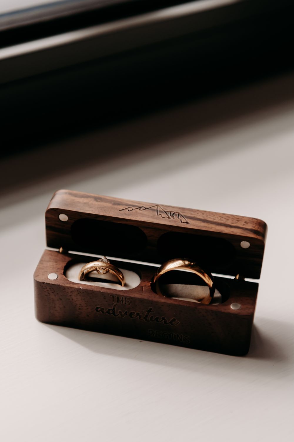 A series of close-up shots showing a wooden pencil sharpener from different angles against a white background.