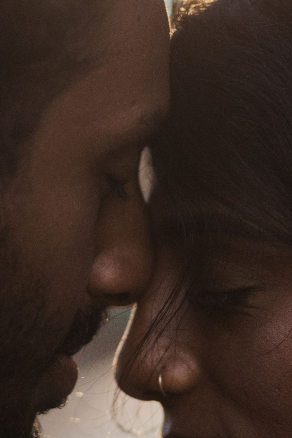 intimate moment between two lovers during their engagement session in Galway, Ireland