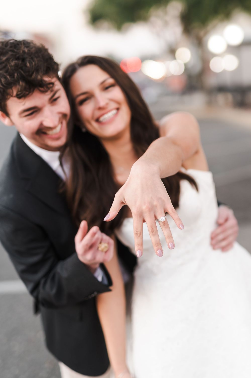 A happy couple in wedding attire sharing joyful moments together in a series of candid outdoor photos.