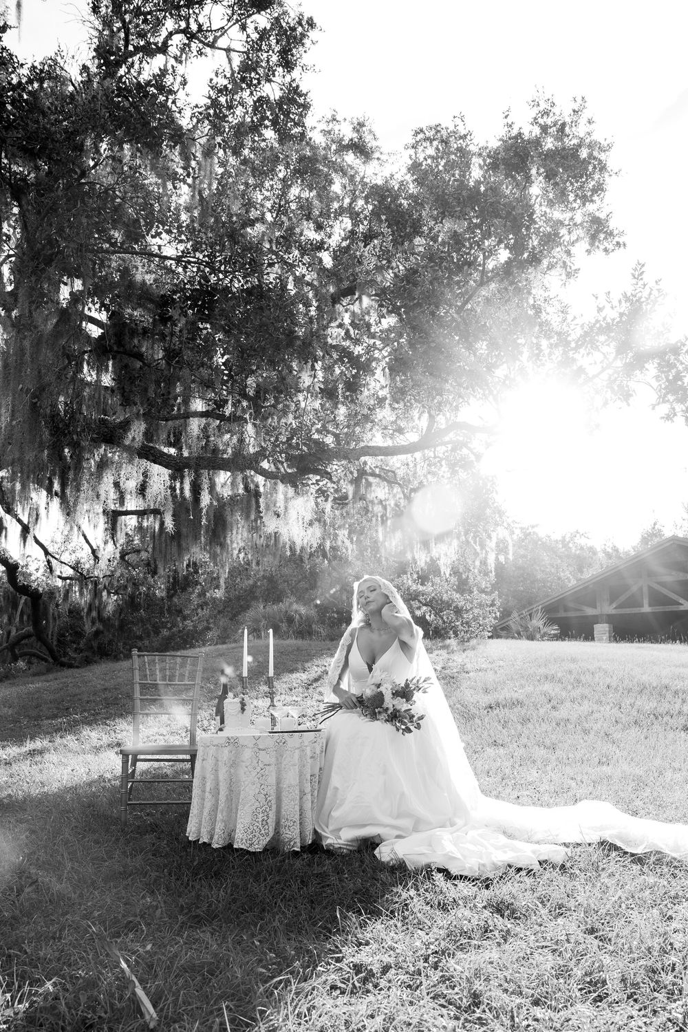 A series of vintage black and white photographs showing a woman in a flowing white dress sitting in a garden setting.