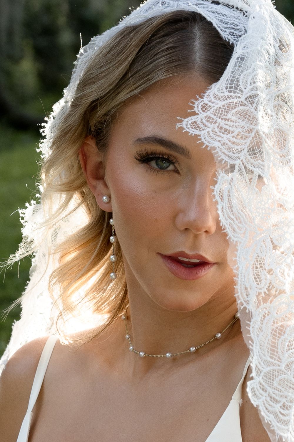 A bridal portrait series showing a veil-adorned figure with artistic close-ups in natural lighting outdoors.