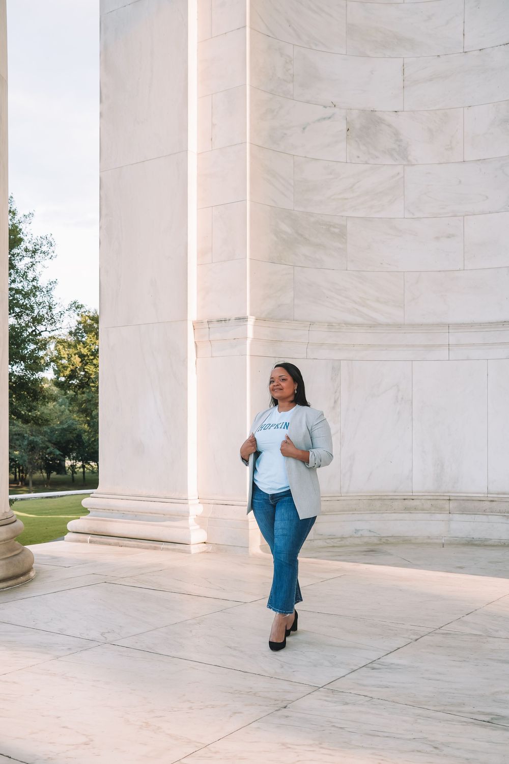 Classic portraits by white marble columns | DC monument-style graduation photos