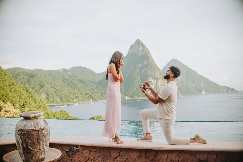 St Lucian photographer captures surprise proposal and engagement photoshoot at Caille Blanc in Soufriere St Lucia in front of the Pitons