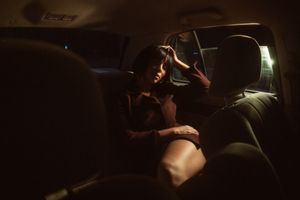 A dark and moody sequence of shots showing someone falling backwards in dramatic silhouette against a window light.