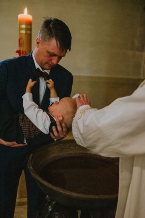 Fotograf chrzest święty Katowice zdjęcia chrzest święty reportaż fotograficzny z chrztu zdjęcia chrzest Katowice fotograf rodzinny Śląsk