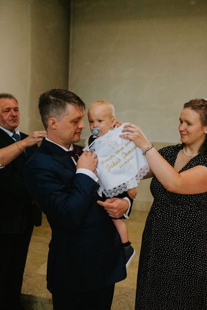 Fotograf chrzest święty Katowice zdjęcia chrzest święty reportaż fotograficzny z chrztu zdjęcia chrzest Katowice fotograf rodzinny Śląsk