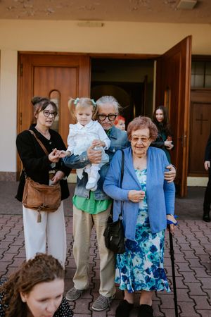 Fotograf chrzest święty Katowice zdjęcia chrzest święty reportaż fotograficzny z chrztu zdjęcia chrzest Katowice fotograf rodzinny Śląsk
