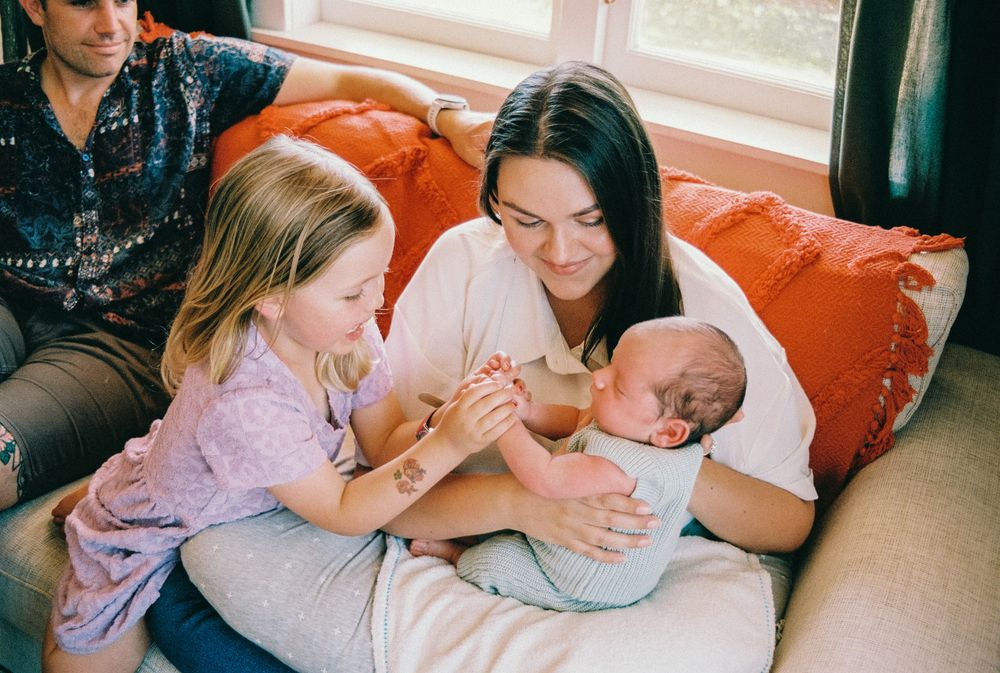Tender candid moments captured in a sequence showing gentle embraces and emotional reactions.