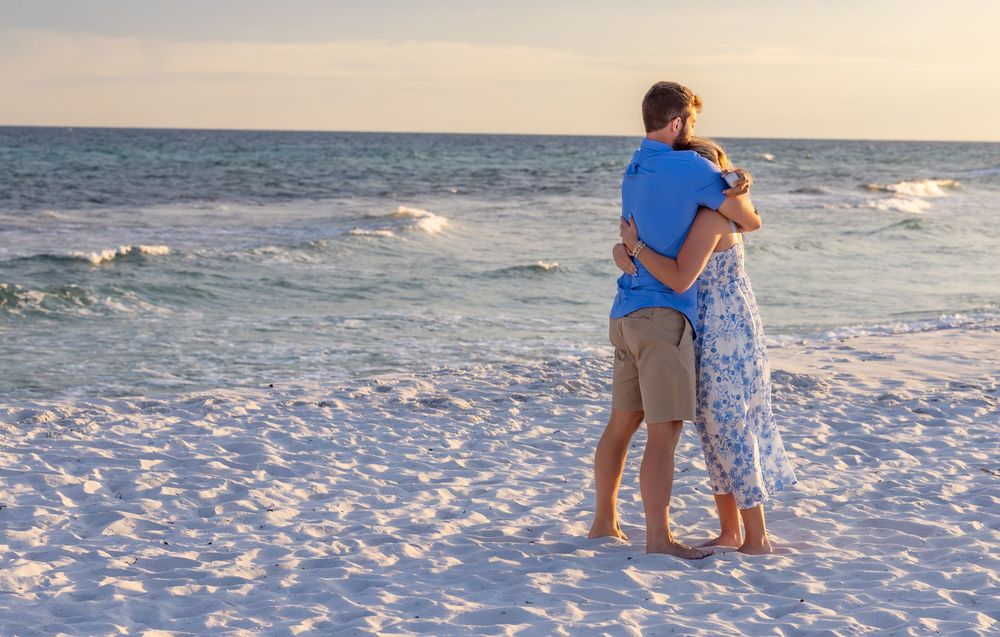 A series of sunset beach photos depicting romantic couples embracing on the shore with ocean waves in the background.