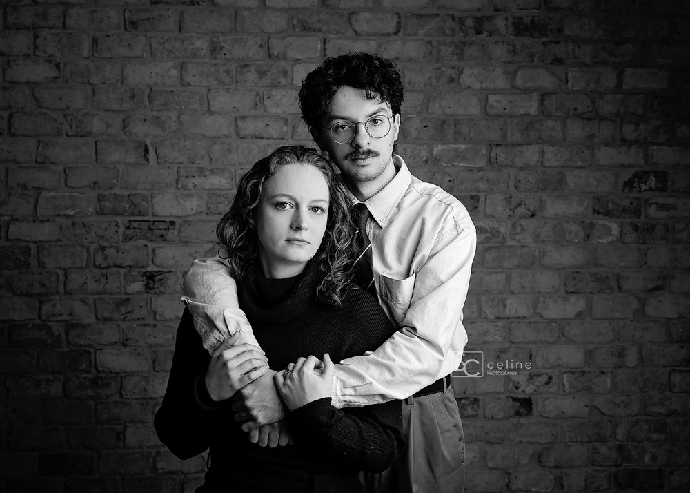 Black and white portrait series showing a couple in vintage style clothing against a brick wall.