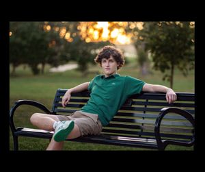 Omaha Senior male sitting on bench