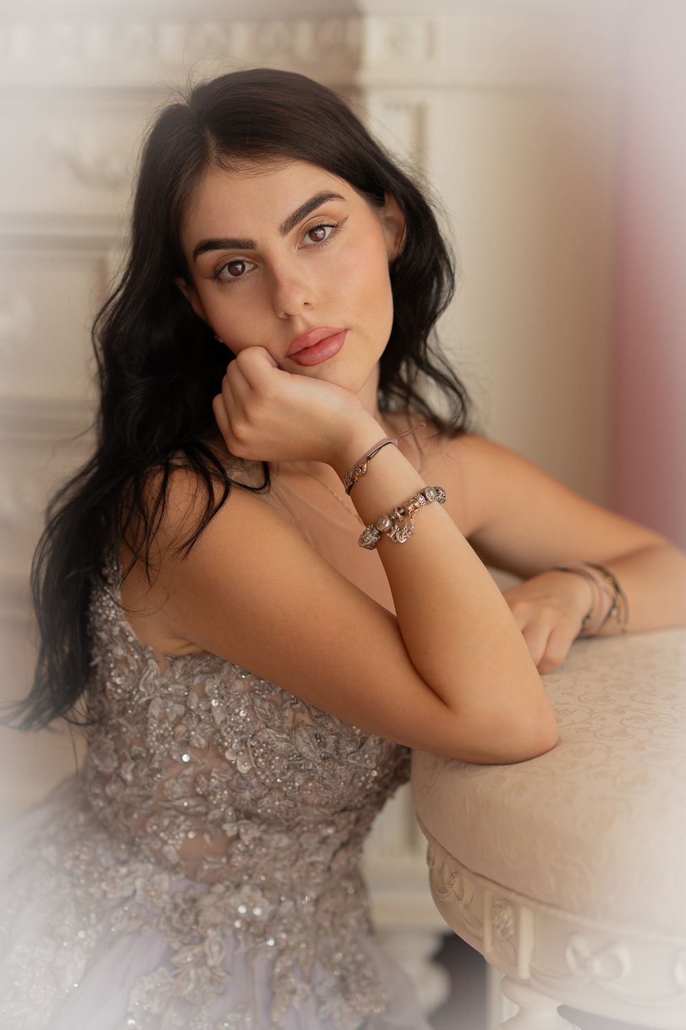 Beautyfotohgrafie - Elegant portrait in soft focus showing a sparkly formal dress and delicate jewelry.