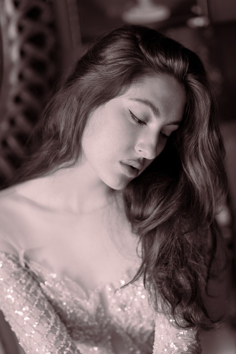 Beauty-, Fine Art Fotografie. Romantic portrait in sepia tones featuring a sparkly evening gown.