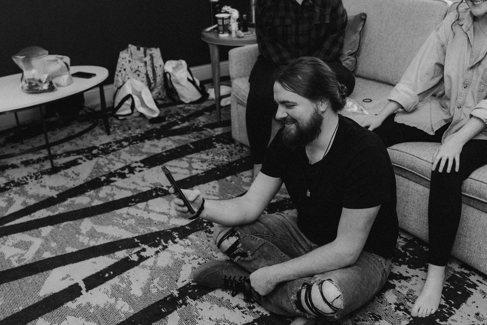 Black and white photo series showing someone using a pottery wheel to shape clay into various forms.