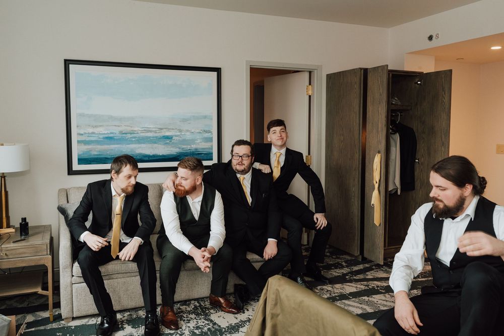 Yorktowne Hotel wedding in York, PA– groom and groomsmen candid shots – elegant winter wedding