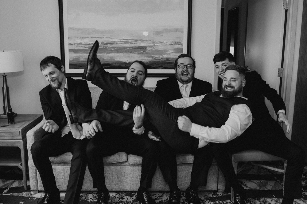 Yorktowne Hotel wedding in York, PA– groom and groomsmen candid shots – elegant winter wedding